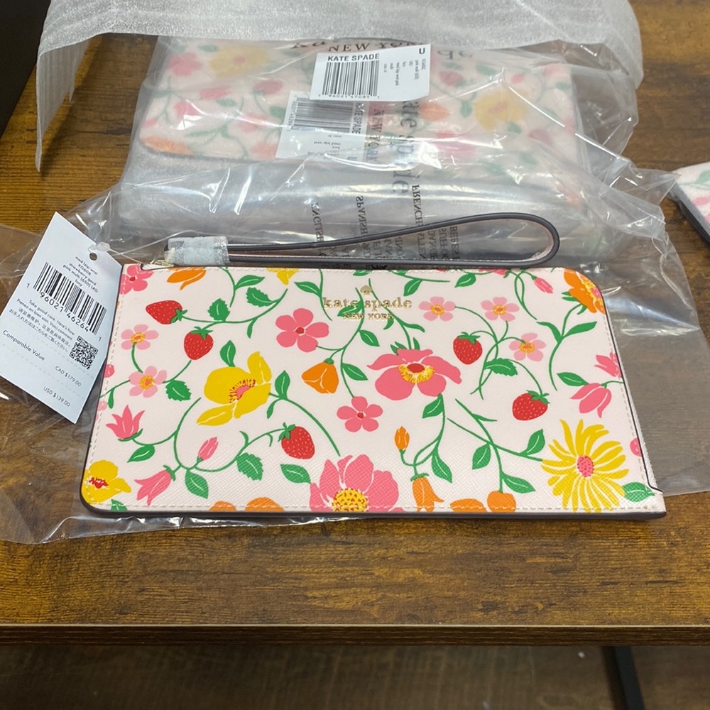 kate spade floral wristlet wallet in pink, yellow, green, red